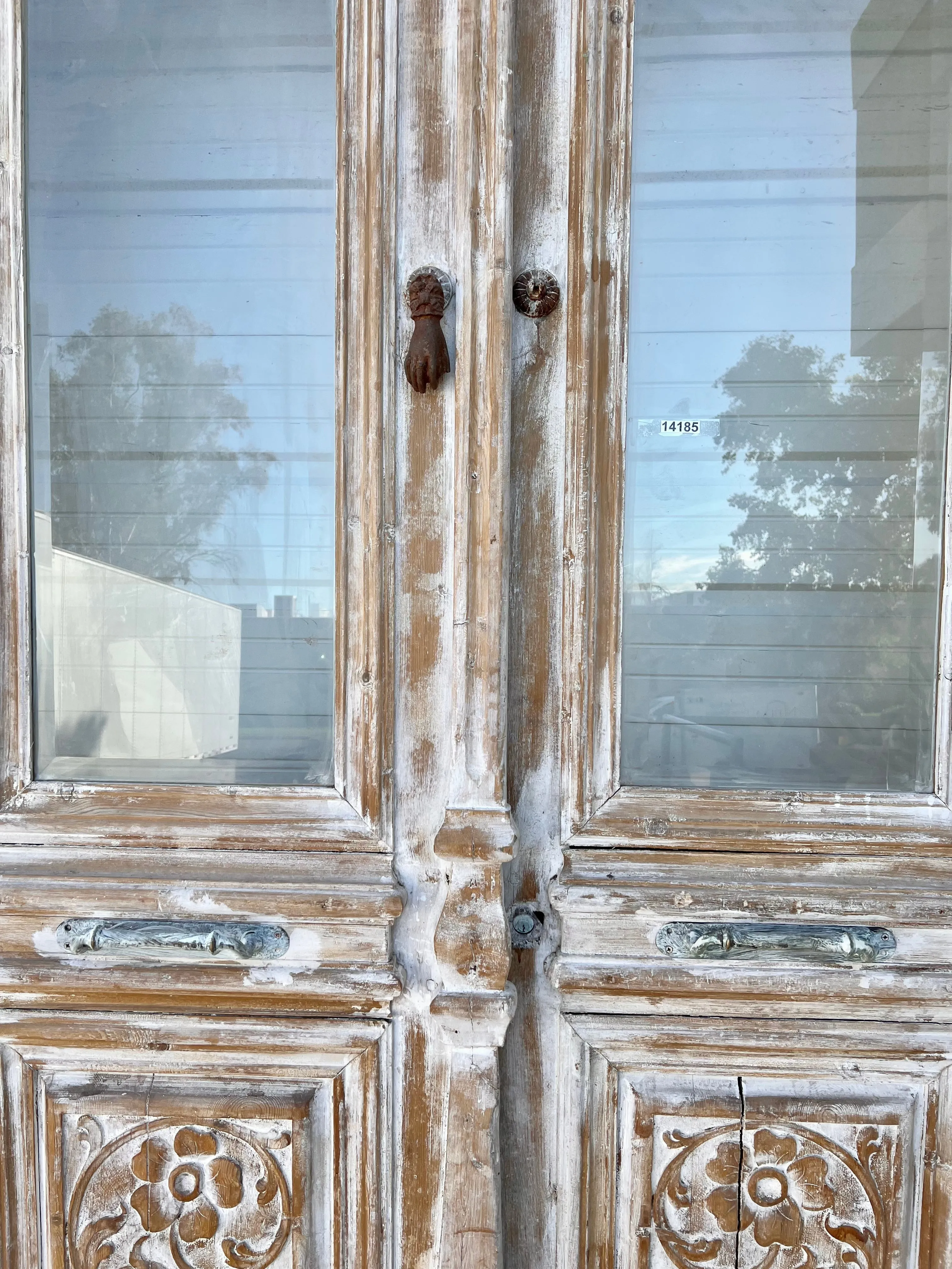 Pair of Ornately Carved Antique Doors in Large Frame with Transom