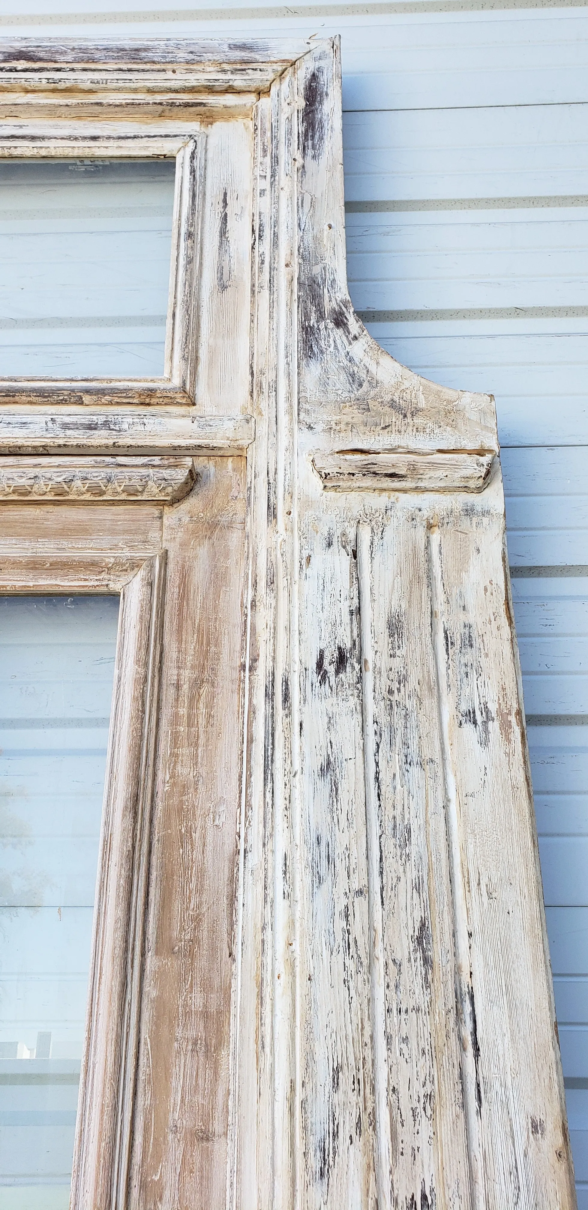 Pair of Washed Antique Wood Single Lite French Carved Doors with Transom Window